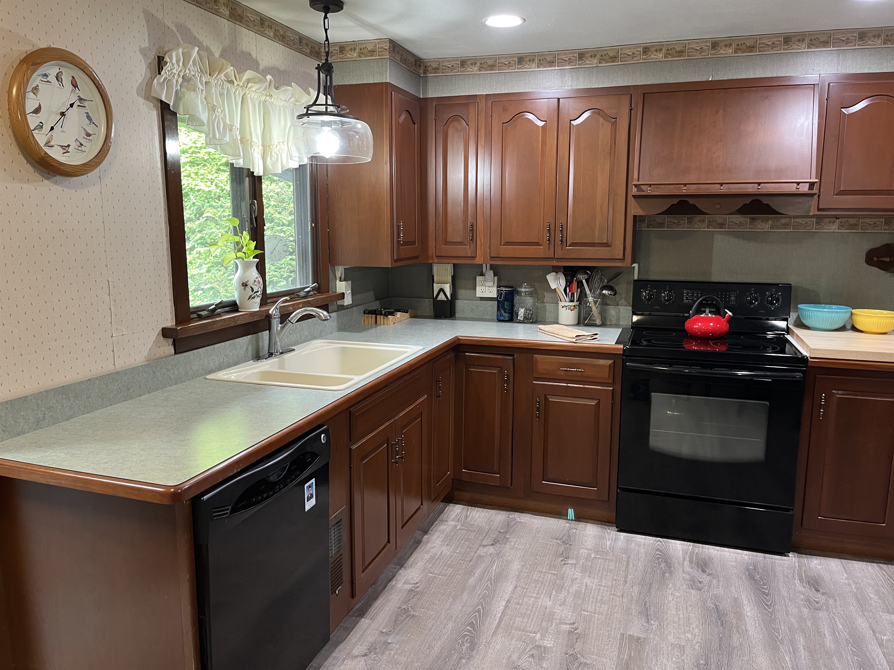 Fully stocked kitchen with plenty of gizmos and gadgets