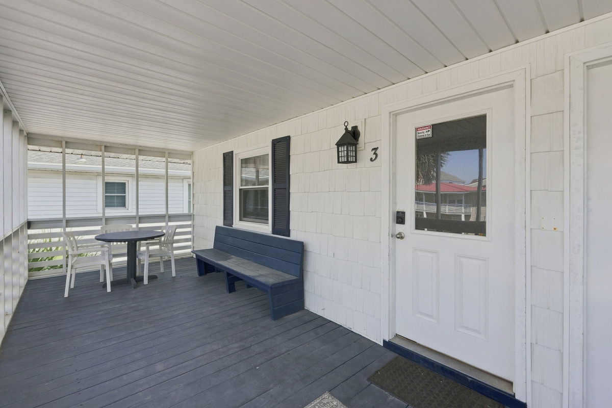 Covered front porch to enjoy the ocean breeze