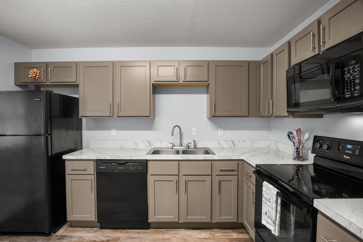 Kitchen dishwasher & refrigerator.