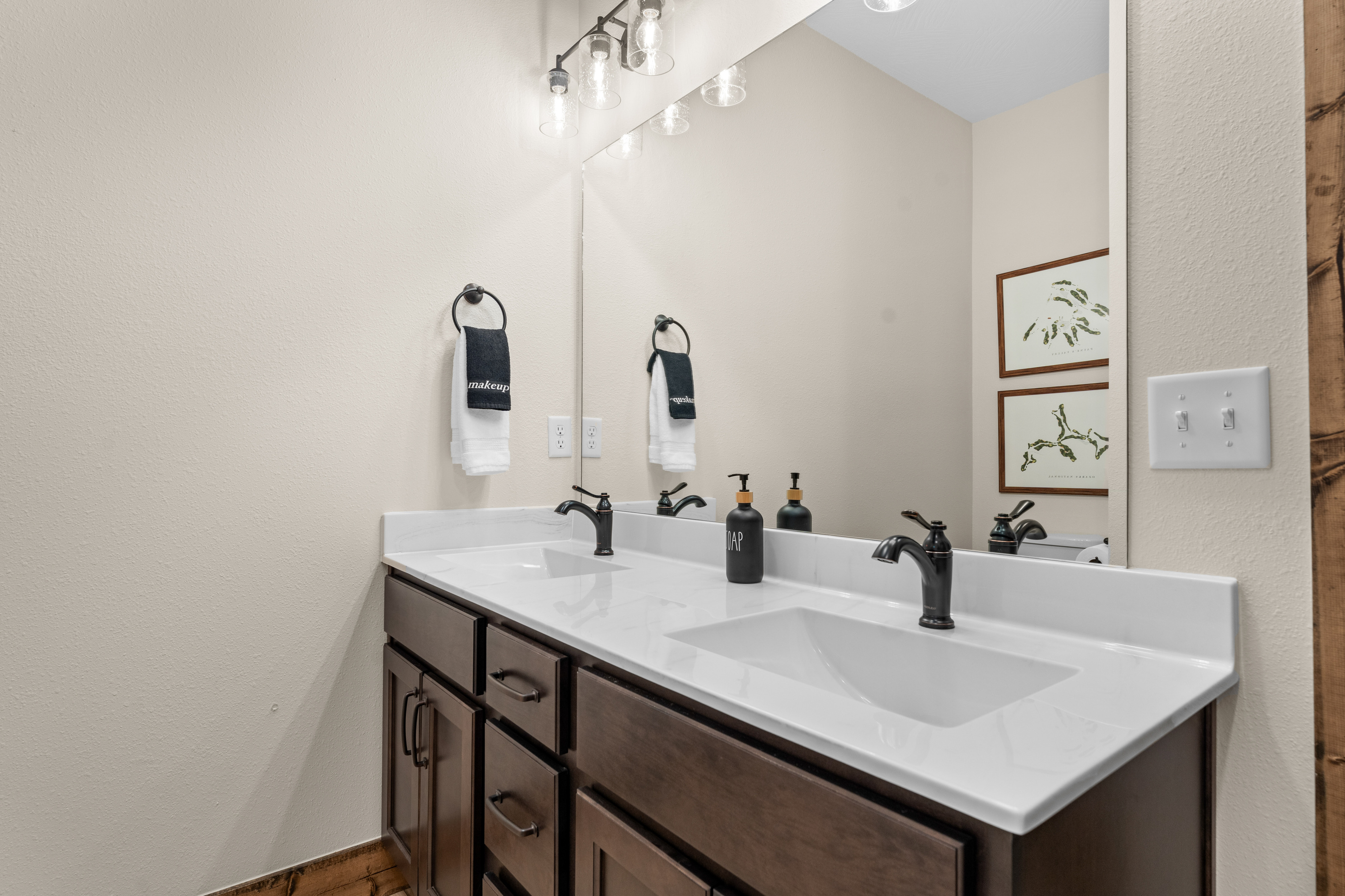 Twin sinks and bright lighting keep busy mornings moving.