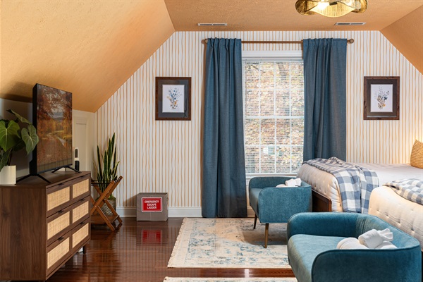 A calm, sunlit king suite designed for slow mornings and restful nights