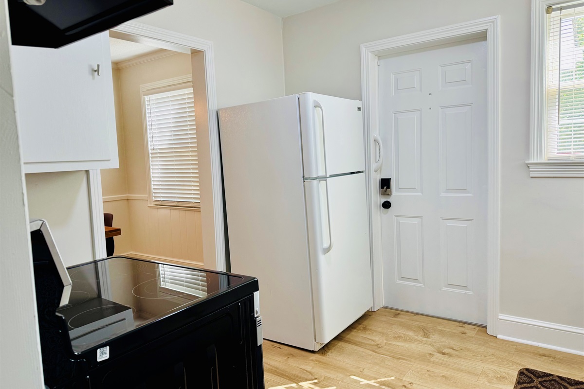 Fully equipped Kitchen with small appliances like Keurig coffee maker, CrockPot, blender and toaster.