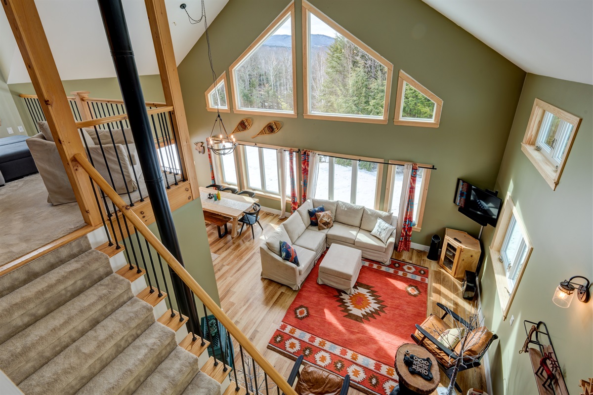 View of the living room as seen from the second-floor loft. 