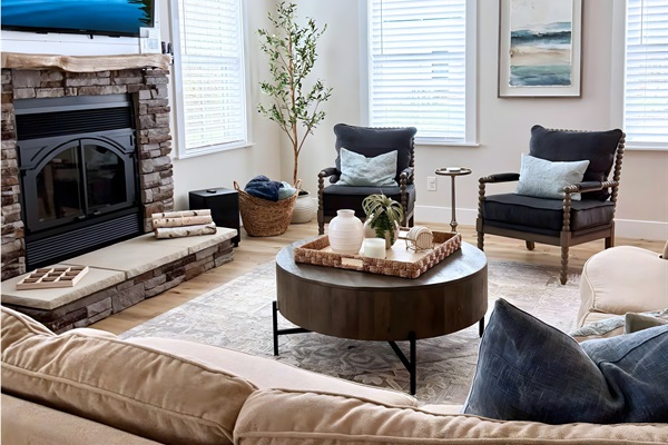 This spacious living area invites relaxation with its comfortable seating, stylish decor, and warm ambiance. Perfect for family gatherings or a quiet night in.