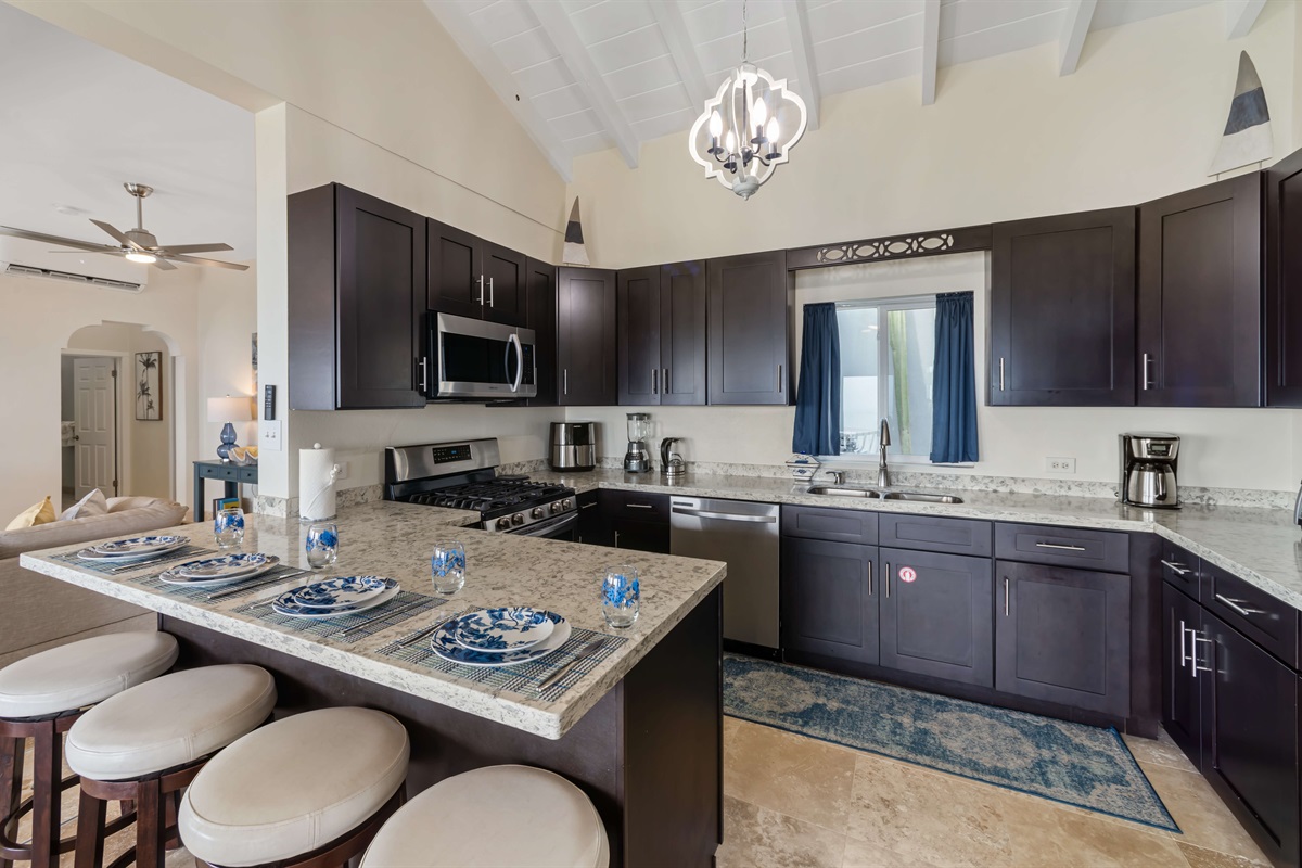 A chef's delight with granite countertops and ample workspace.