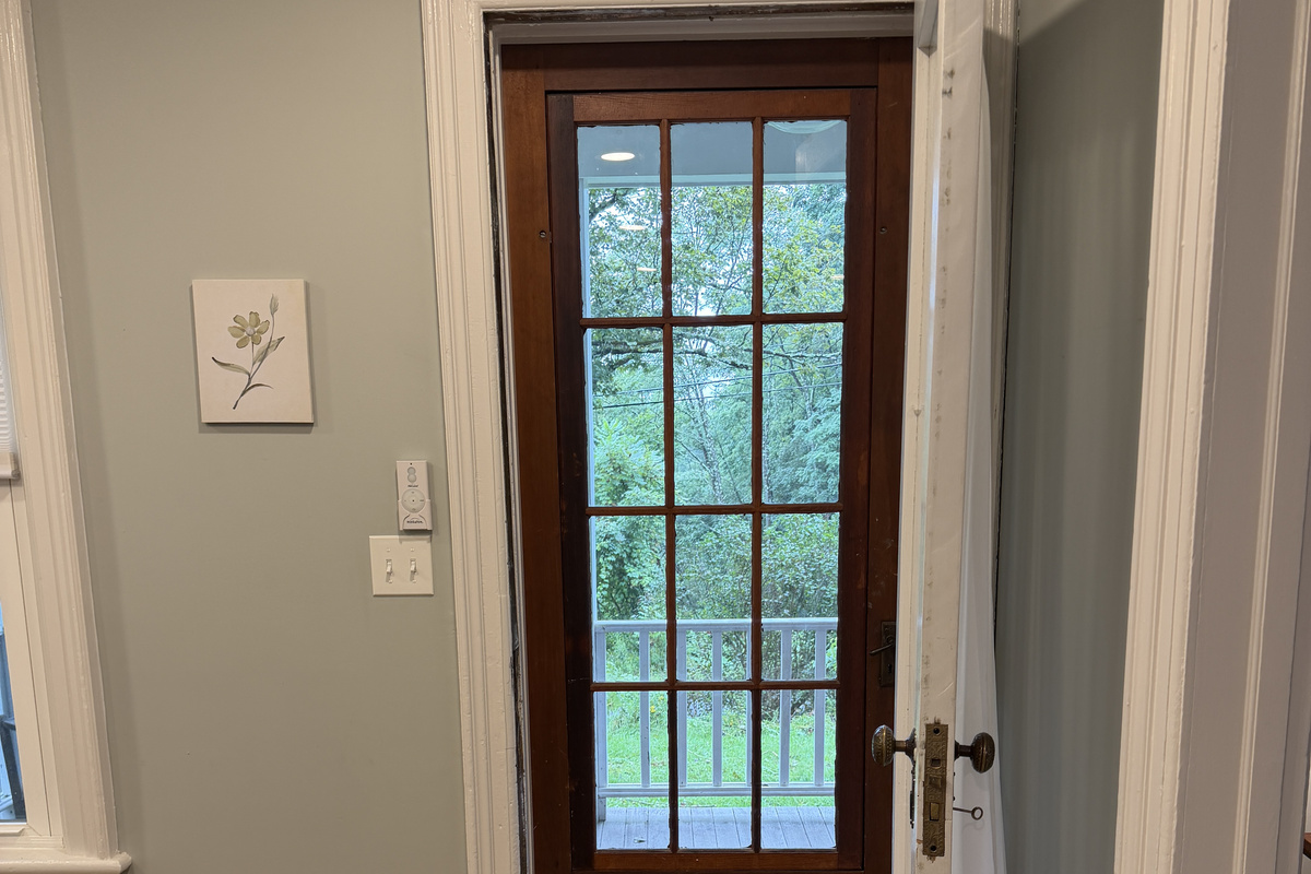Door to covered front porch