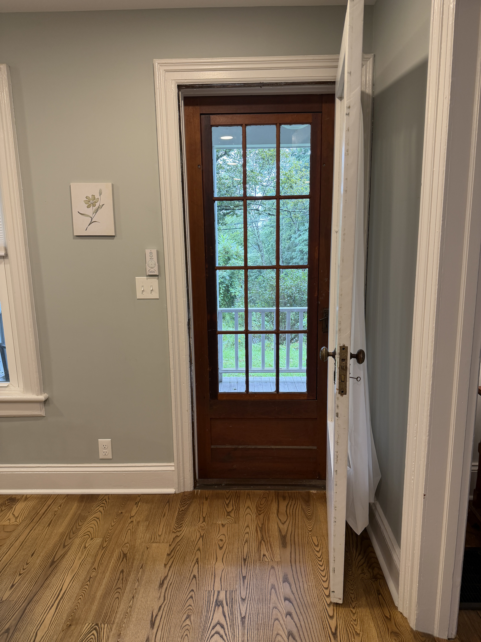 Door to covered front porch