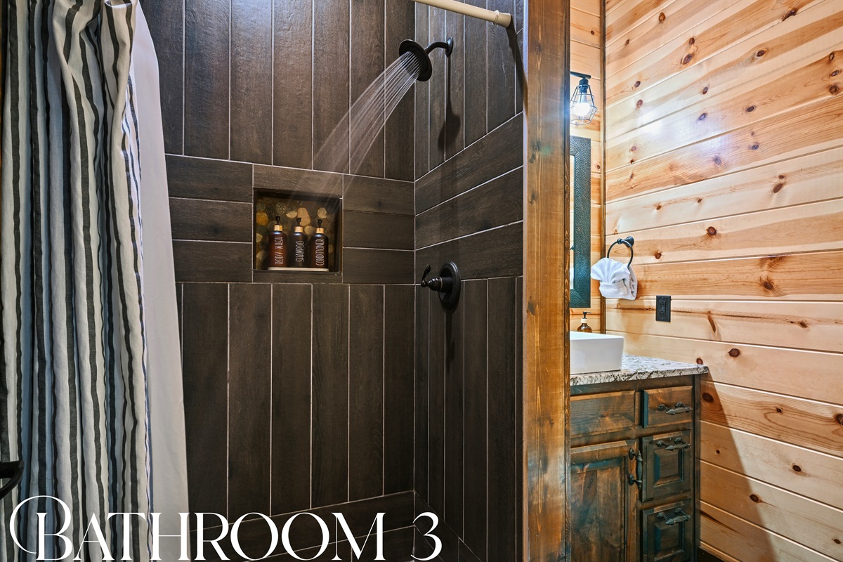 Bathroom 3 offers a clean, modern space with walk-in shower and thoughtful amenities for your comfort.