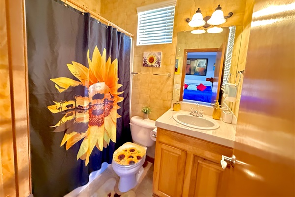 Ensuite Full Bath: Conveniently attached to the main-level king bedroom for added privacy and comfort.