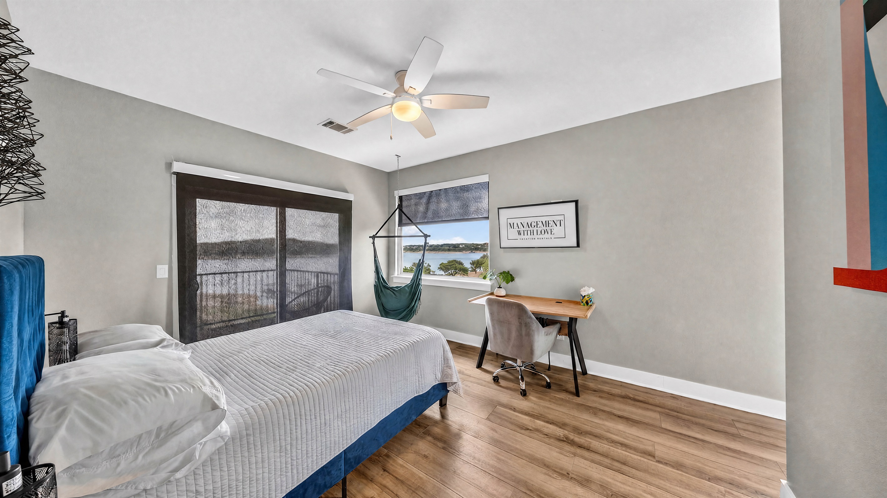 - Bright lakeview bedroom with workspace ideal for remote focused stays - Natural light enhances mornings and lifts your refreshing vacation mood - Cozy layout supports comfort, productivity, and calm throughout stay