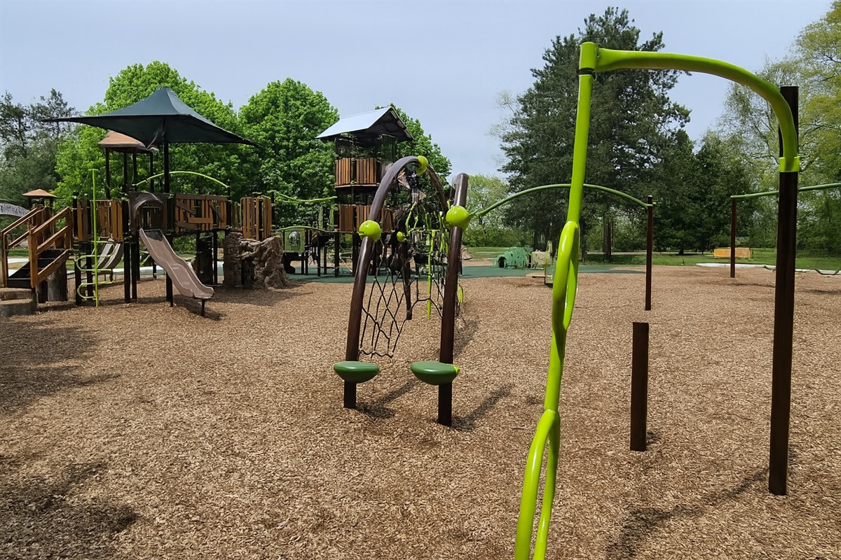 Expansive Play Area with Slides, Swings & Climbing Fun – Bay Court Playground Has It All!