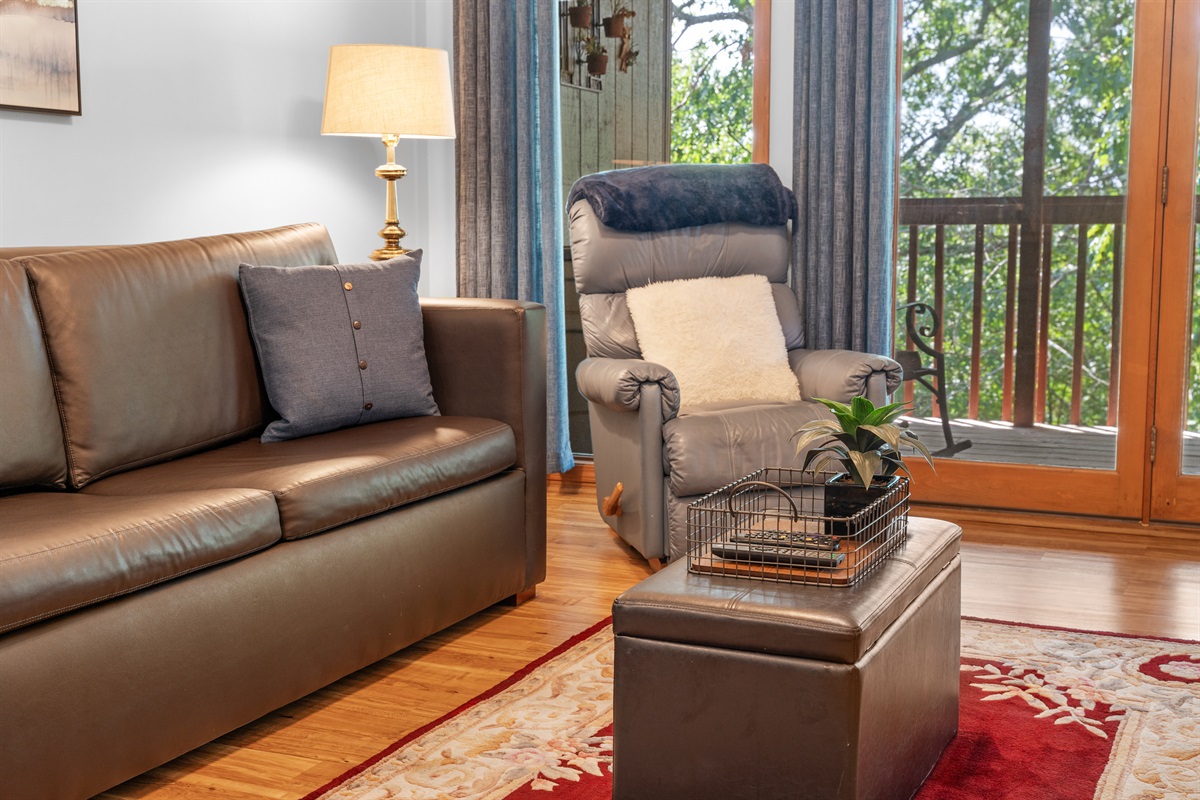 A quiet perch just outside the living room invites one more cup of coffee or a nightcap.