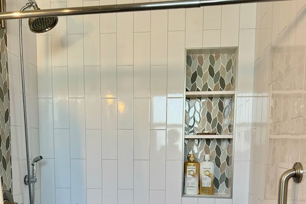 Stylish and functional—this modern bathroom blends elegance with practicality for a cozy, refreshing space, Btw, it’s handicapped accessible if you need that! - Tanya (2021)