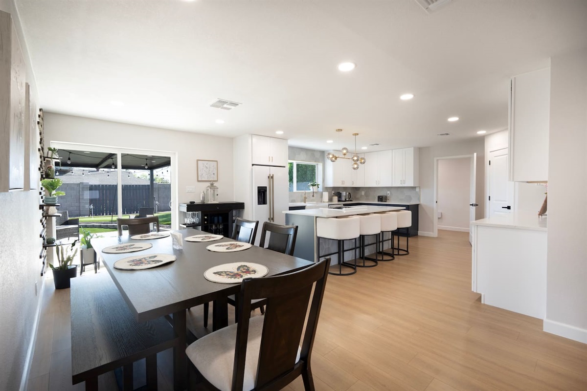 Open-concept kitchen and dining space with seamless indoor-outdoor flow—perfect for gathering, dining, and entertaining