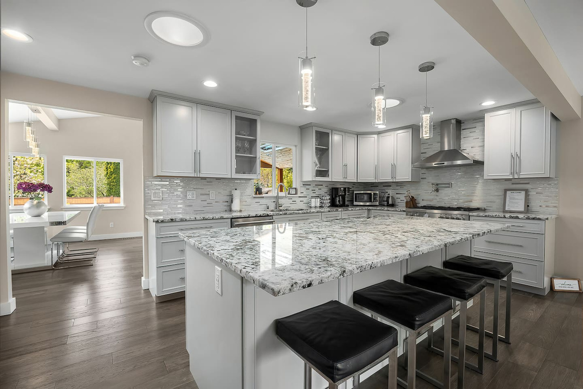 “This luxury gourmet kitchen features premium appliances, custom cabinetry, and a spacious island designed for effortless cooking and elegant entertaining.”