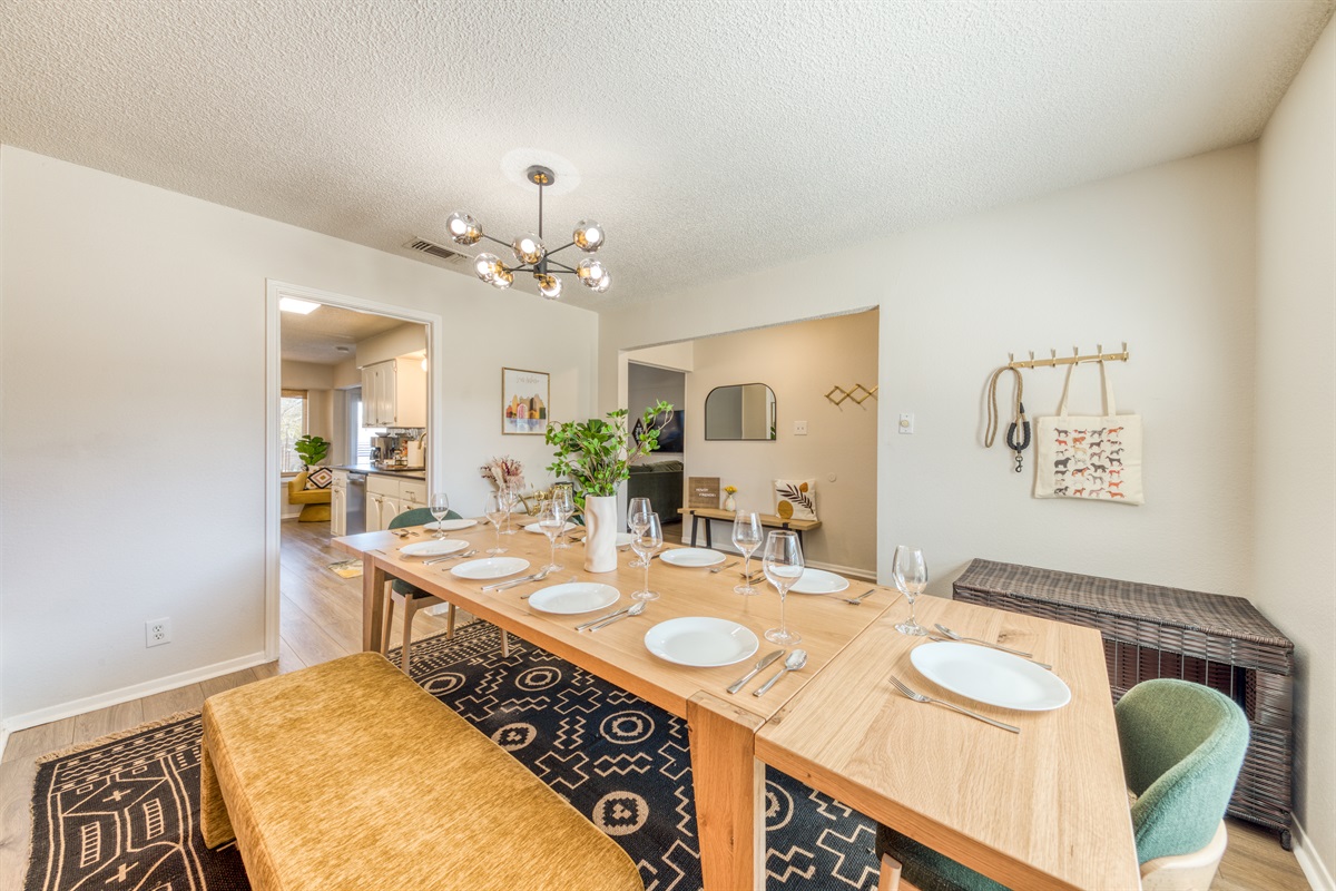 Dining room has dog kennel with leash and tote bag for your convenience