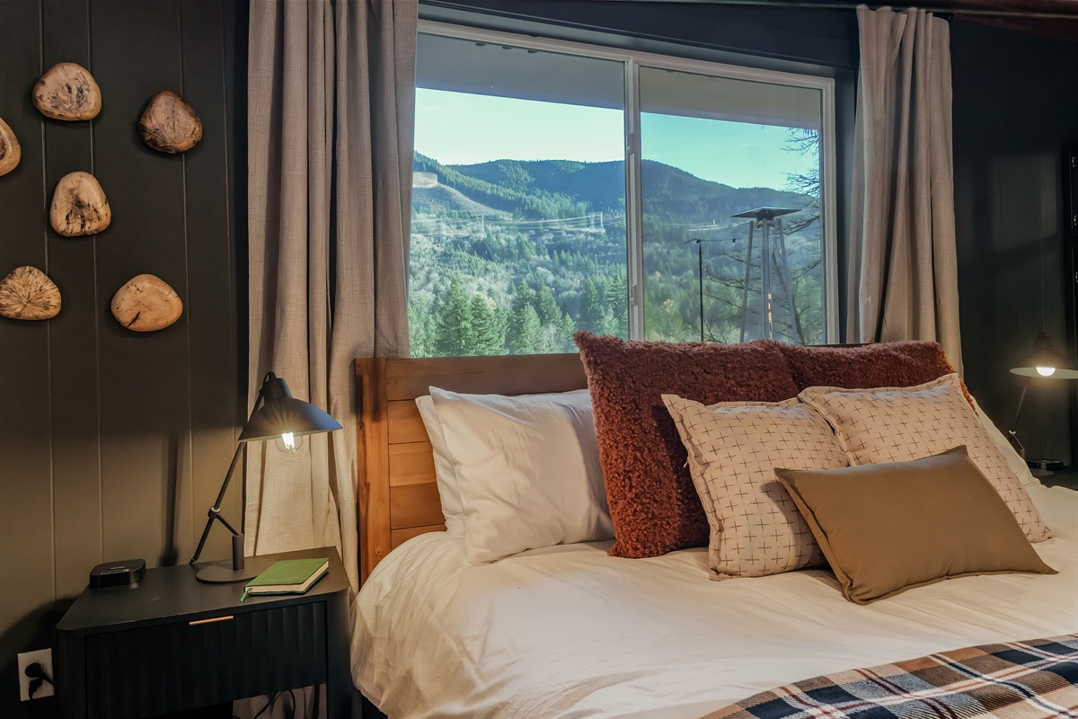 Wake up to sweeping mountain views right from the master bedroom. Cozy textures, soft lighting, and a plush king bed make this your perfect retreat after a day on the trails.