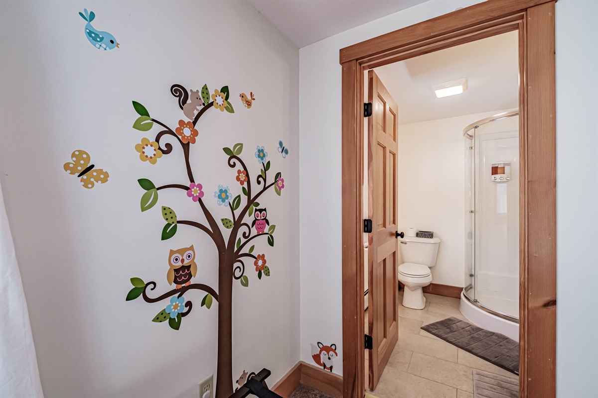 A private full bath for the bunk room with shower and toilet.
