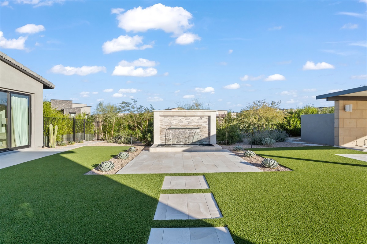 This uniquely designed wall waterfall is the perfect area to stretch in the morning.  a