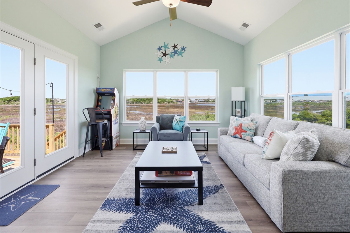 Sun-filled living space with marsh views and room to unwind