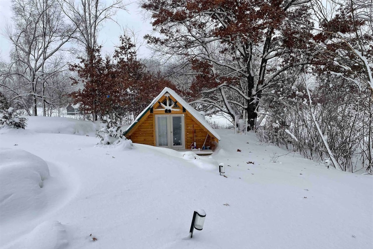 The cabin sits about 200 yards from the lake, but we own all three sides of the road so you do not have to walk through someone else's yard to get to it. 
