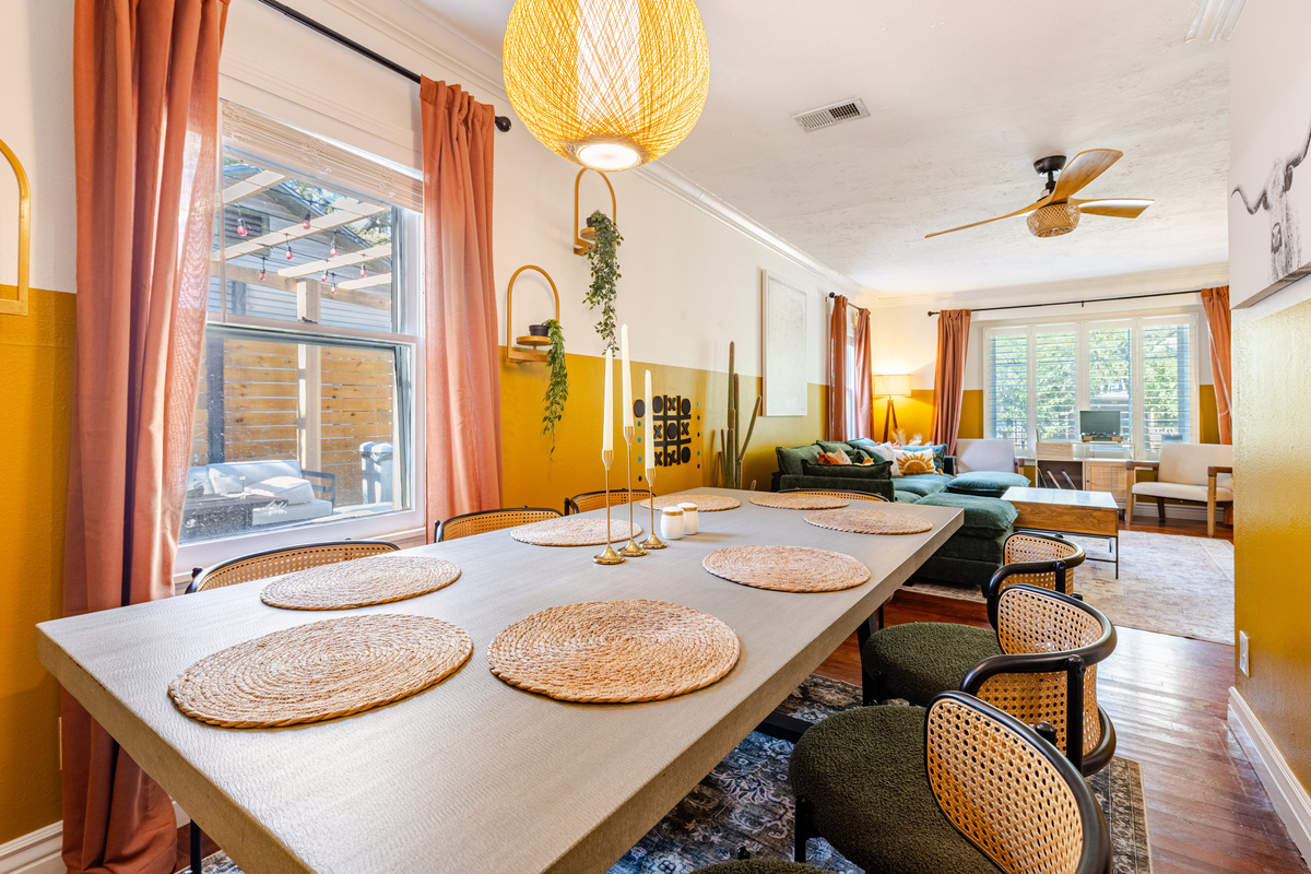 Bright, warm space for meals and relaxation, featuring stylish decor and views!