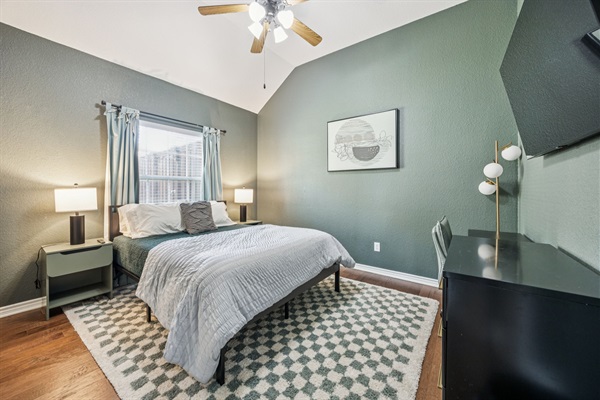 Queen bed with stylish, relaxing décor, 55” Smart TV for movies or shows in bed, and a desk if you need to get work done.   