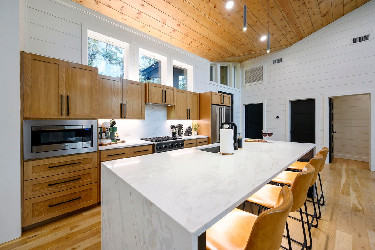 Plenty of counter space, modern appliances, and room for everyone to gather while meals are prepared.