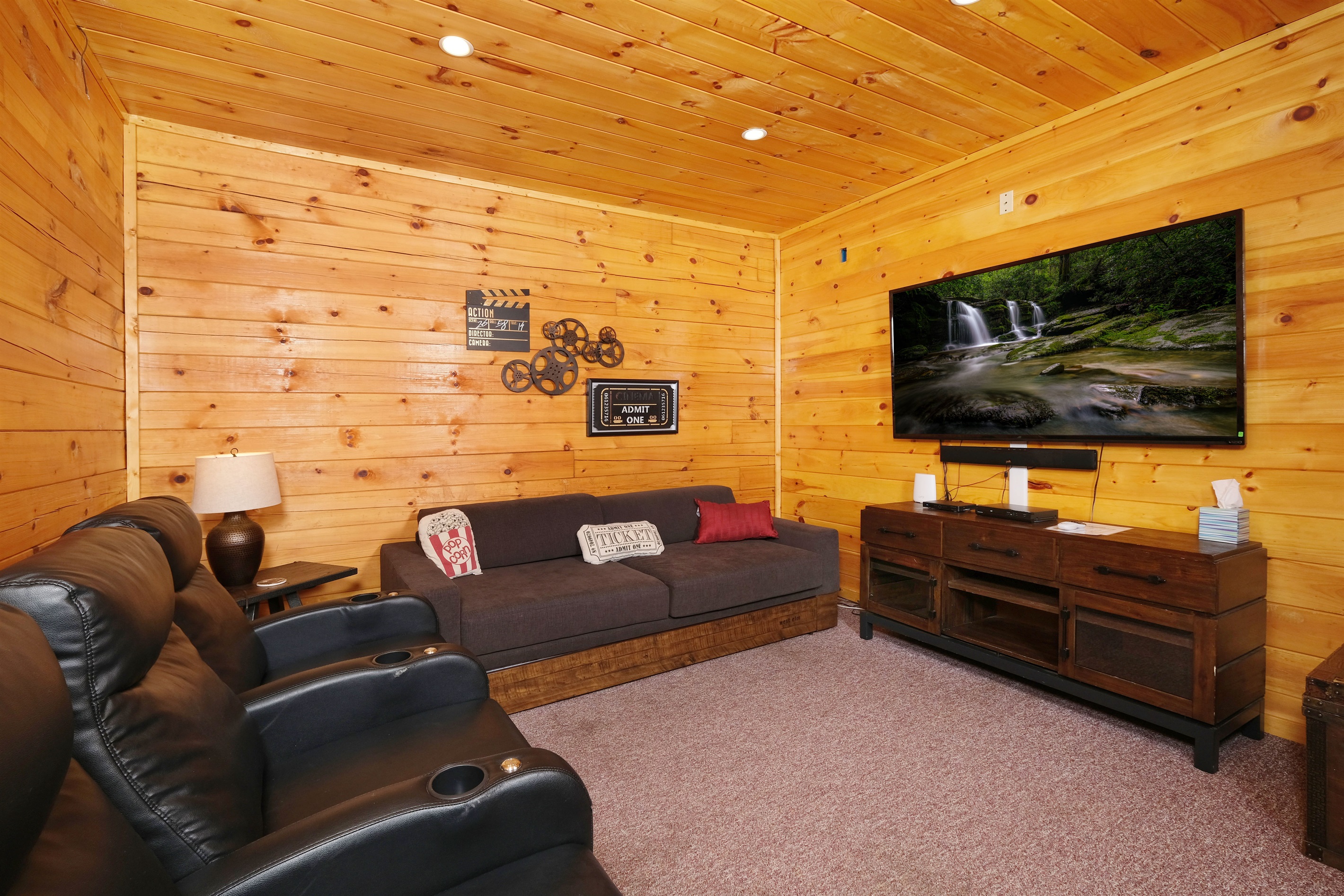 Movie theater room with sofa/trundle bed