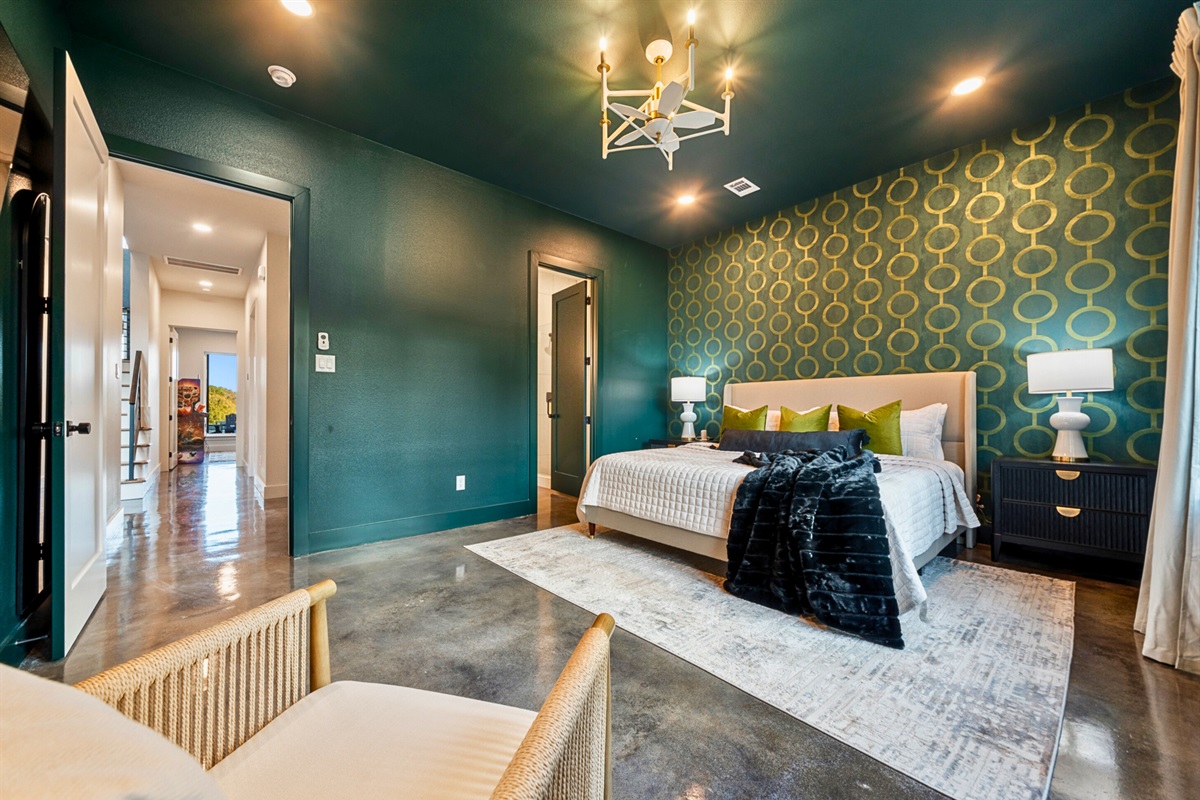 Vibrant decor and plush bedding make this king bedroom both stylish and comfortable &ndash; a cozy spot to call your own.