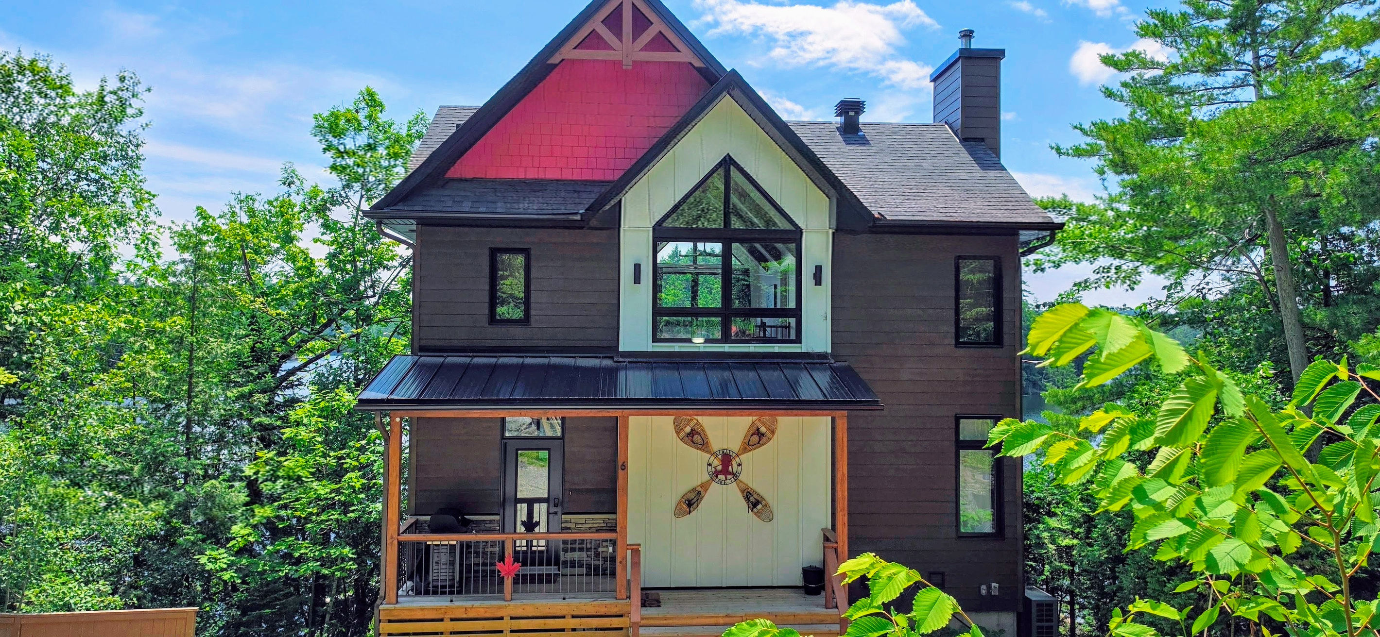Front of cottage from driveway showing entrance door