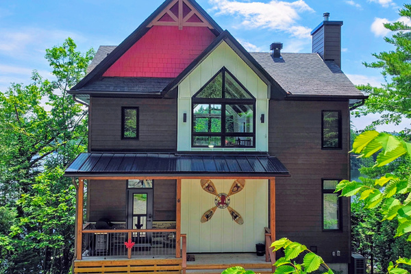 Front of cottage from driveway showing entrance door