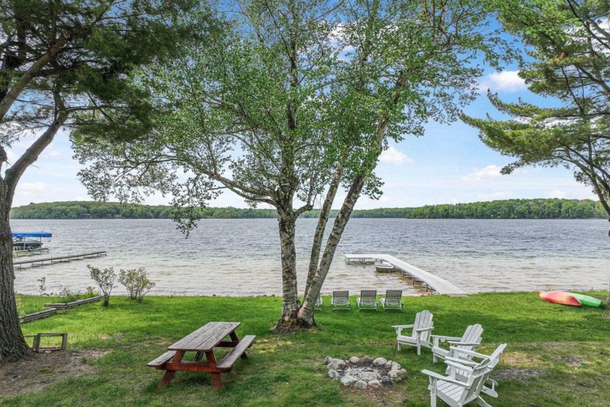 Crystal-clear water, sandy bottom, and your private dock—perfect for swimming + boating