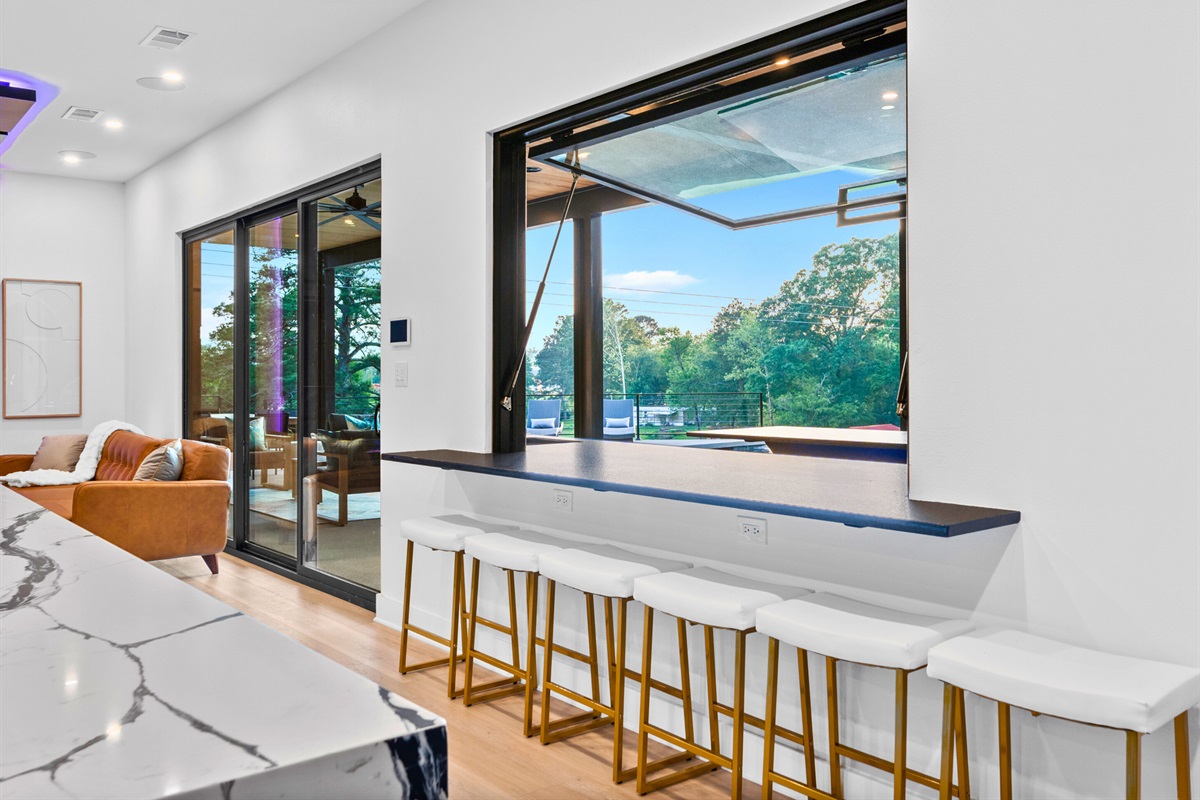 Perfect for morning coffee or evening cocktails. Cheers to this amazing indoor-outdoor bar!