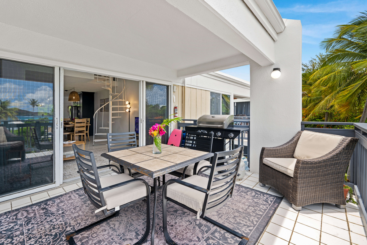 Your private outdoor retreat offers breathtaking Caribbean views.
