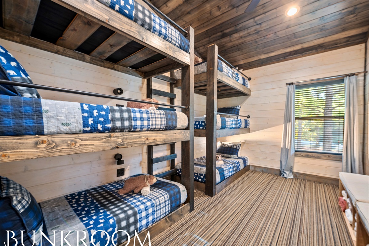 The perfect space for kids or extra guests, this fun bunkroom offers plenty of sleeping space and storage.