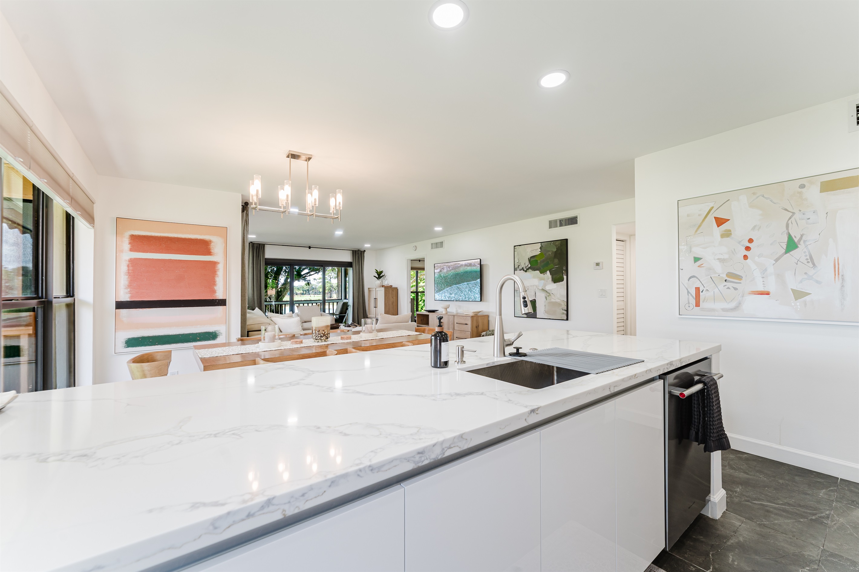 Fully equipped kitchen with everything needed for home-cooked meals. Modern appliances and ample counter space for easy meal prep. Bright and functional kitchen perfect for extended stays.