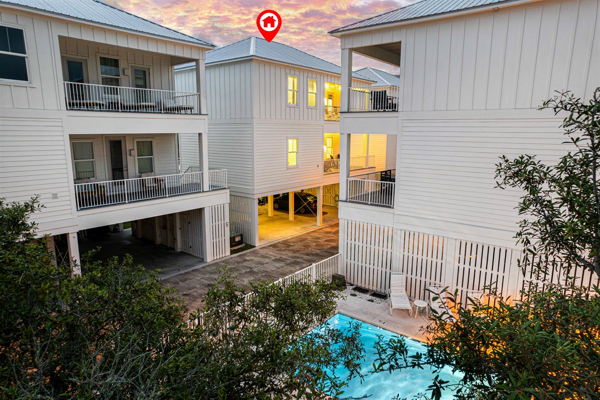 Close enough to the pool but not where the noise will bother you!