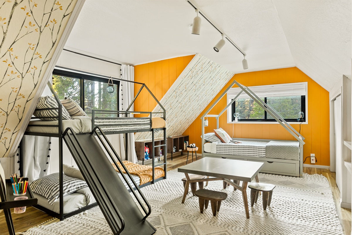 The kids' room offers a perfect space for your little ones to have their own unique area for play and exploration!  And guess what? The single twin bed converts into a full king size bed!