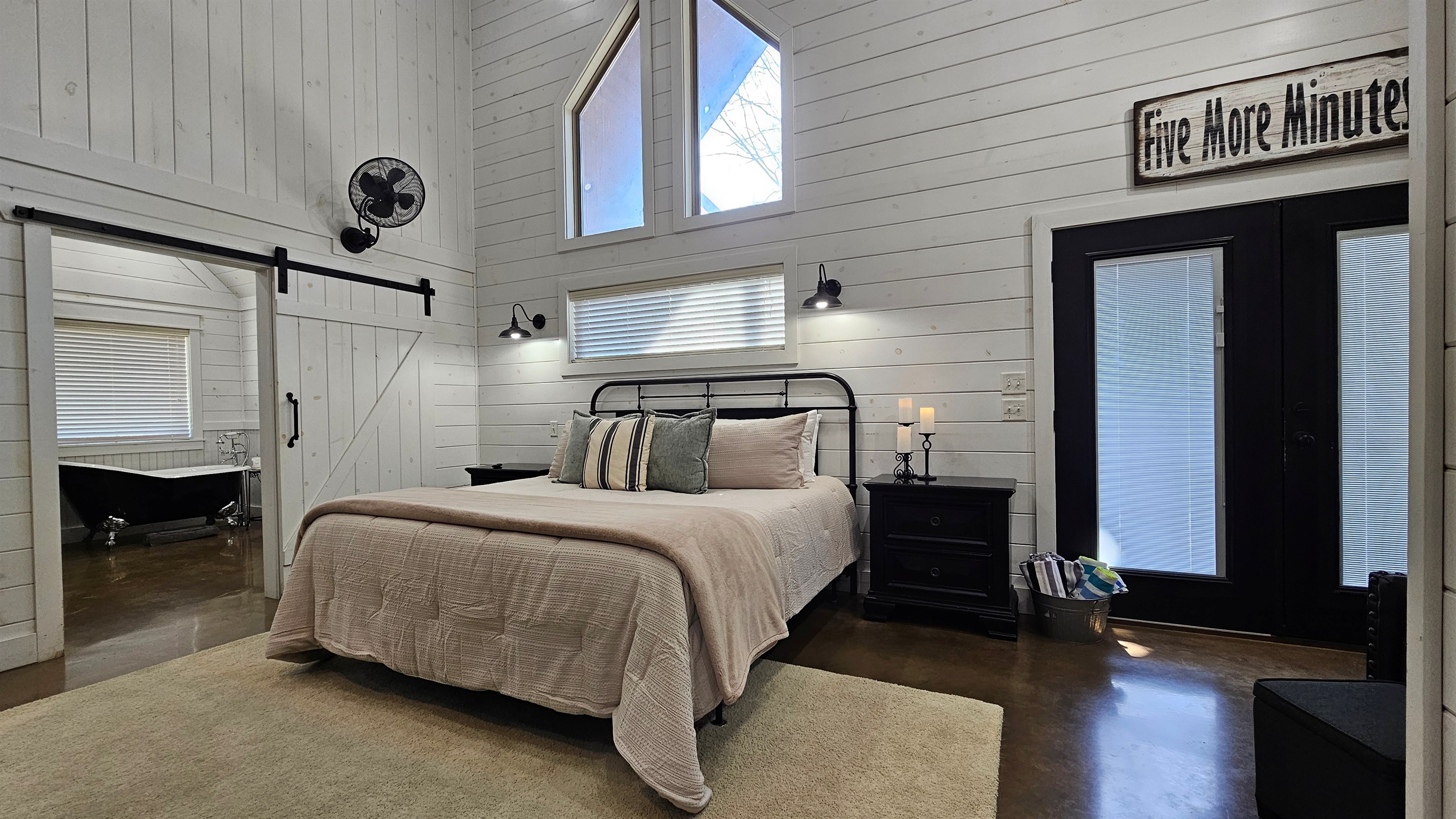 Charming Retreat: Relax in this stylish room with stunning stone accents and nature views!