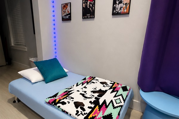 Single size fold out futon bed. Child-size only.