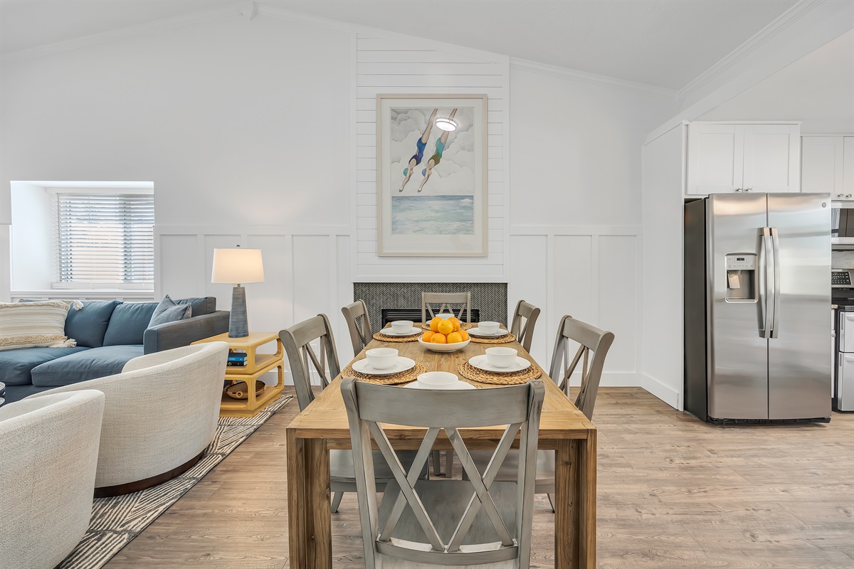 An open dining space that flows seamlessly into the kitchen and living room 