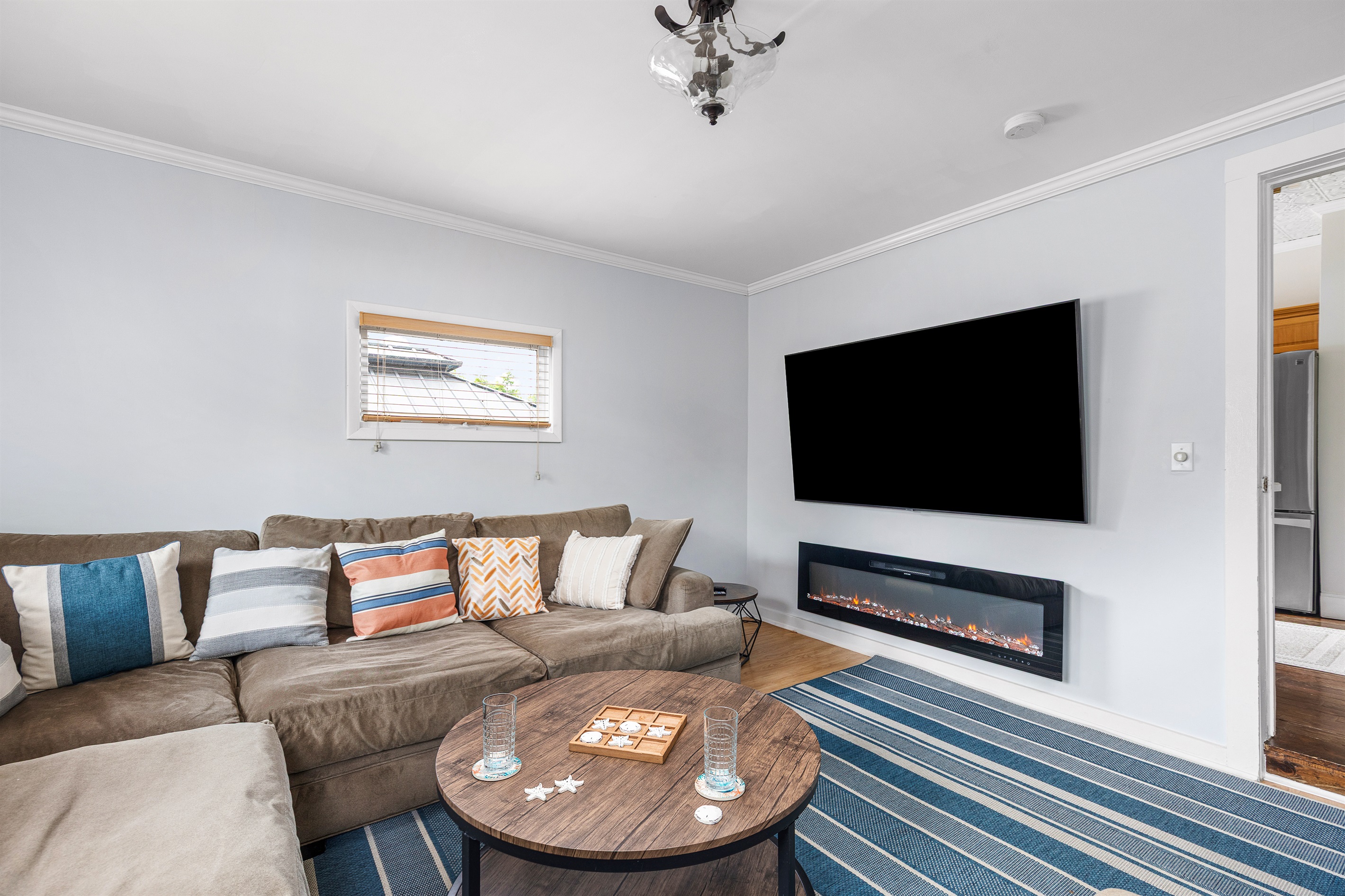 Settle in for movie nights by the fireplace where the whole group naturally gathers after sunset.