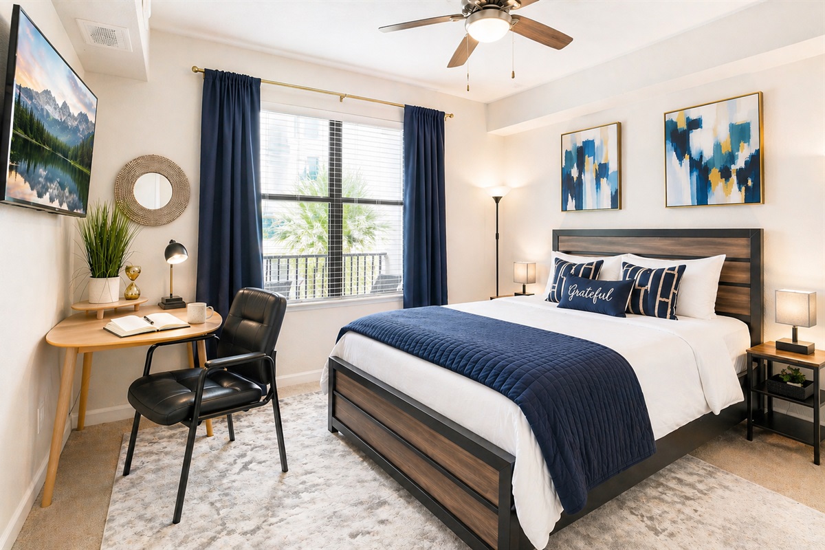 The large smart TV is perfect for watching shows from bed! The comfortable bedroom has plenty of space. Draw the blackout curtains for a good night's sleep. 