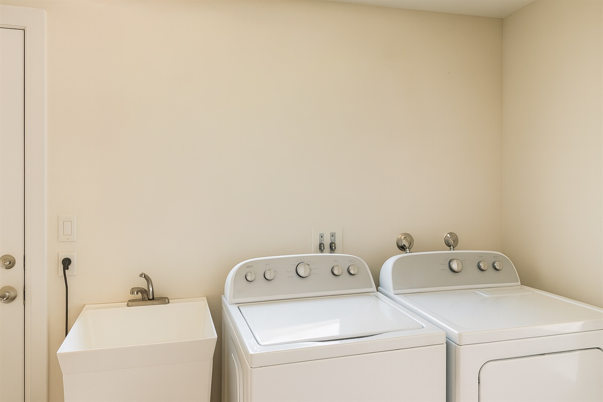 laundry area | Representative Interior. Finishes and decor vary by Villa