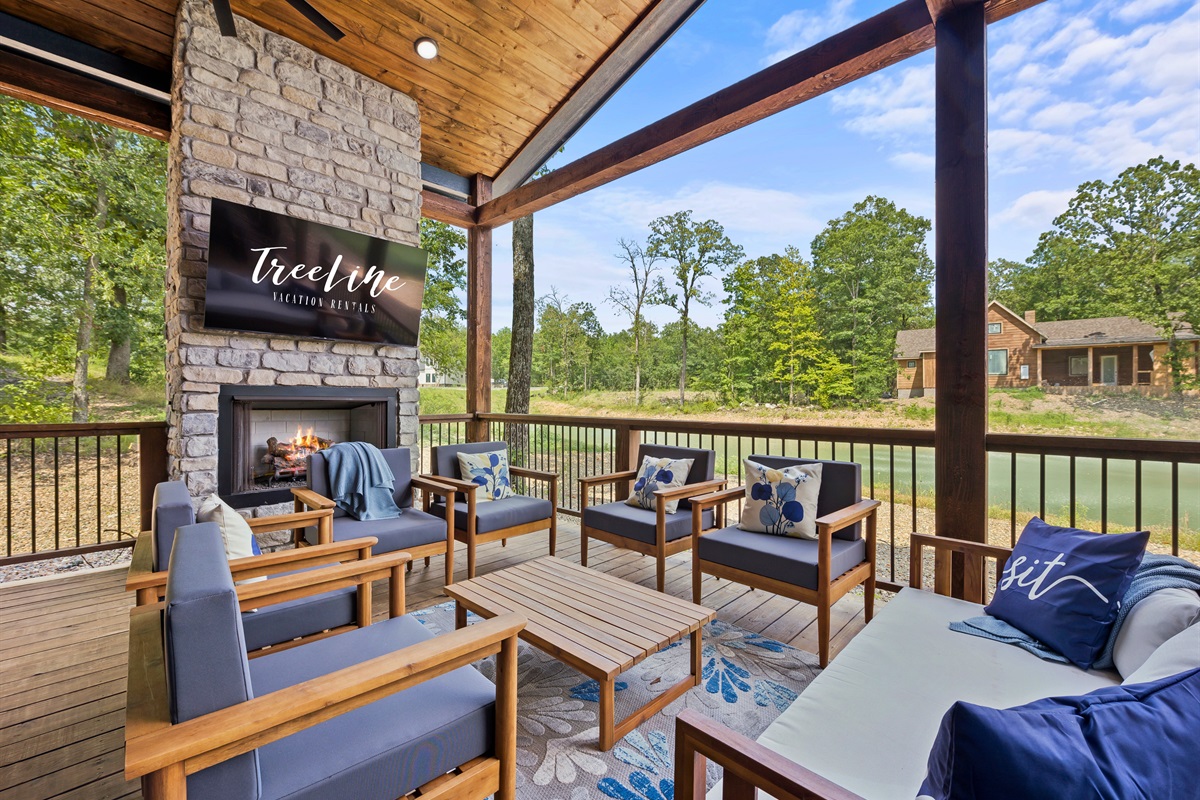 Cozy up by the outdoor fireplace and let the serene woodland views set the mood for an unforgettable evening at our tranquil escape.