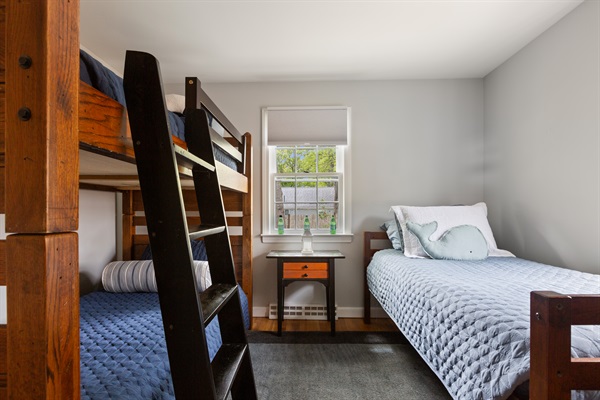 Rest and relax in the second bedroom with a twin and twin bunk bed, great for kids or guests!