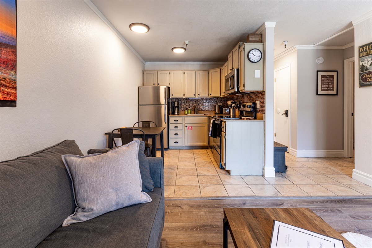 Well equipped kitchen with dining / work space.
