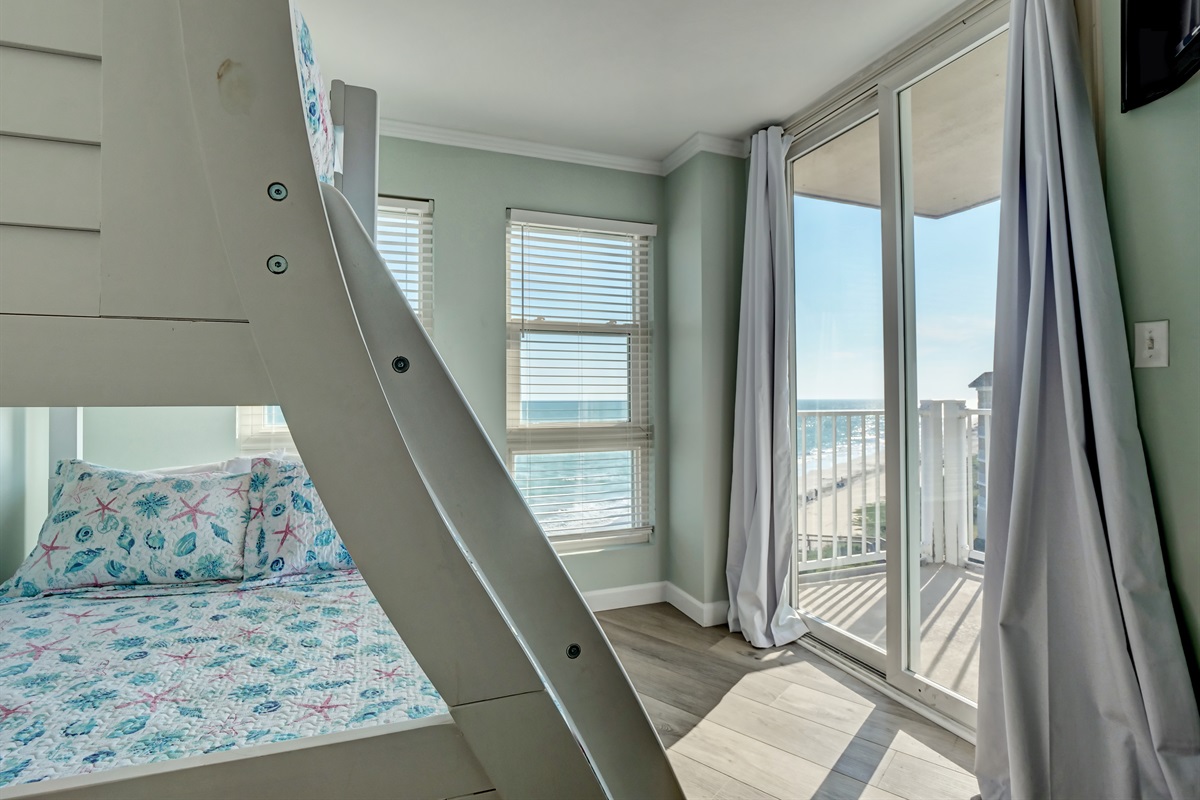 Bunk bedroom has access to side balcony