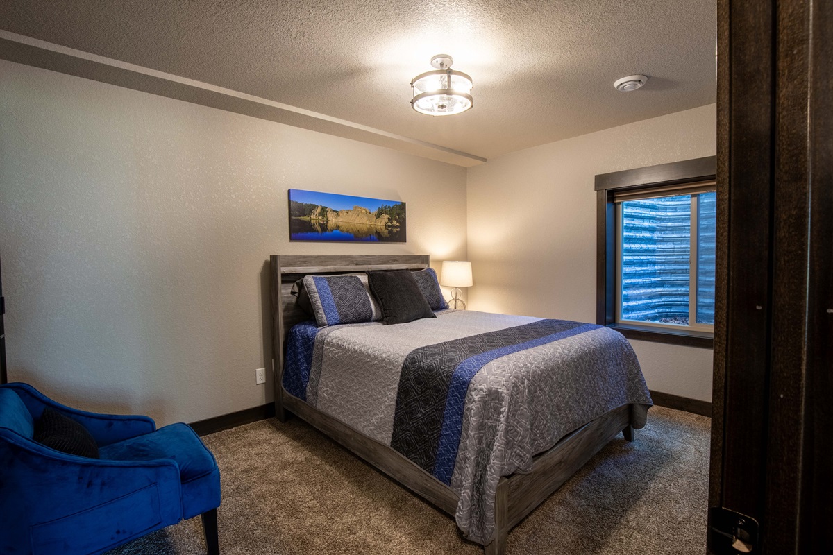 Plenty of room to spread out and make yourself at home in the lower level queen bedroom.